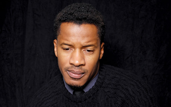 Director, writer, and actor Nate Parker poses for a portrait to promote the film, "The Birth of a Nation", at the Toyota Mirai Music Lodge during the Sundance Film Festival on Monday, Jan. 25, 2016 in Park City, Utah. (Photo by Matt Sayles/Invision/AP)