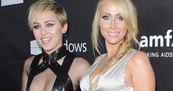 HOLLYWOOD, CA - OCTOBER 29: Singer Miley Cyrus and Tish Cyrus arrive at the 2014 amfAR LA Inspiration Gala at Milk Studios on October 29, 2014 in Hollywood, California. (Photo by Jon Kopaloff/FilmMagic)