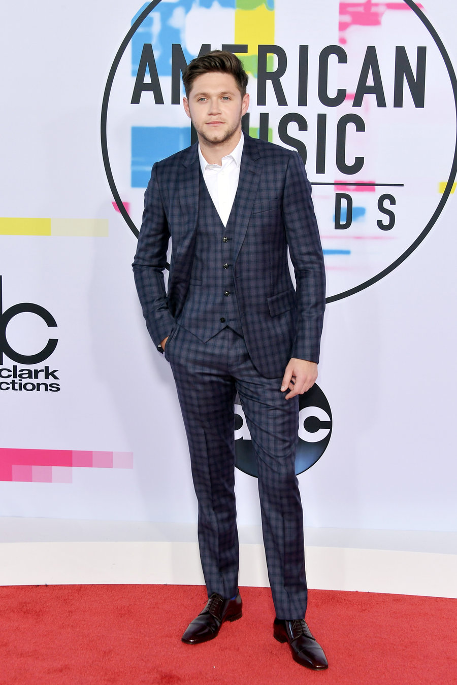 Niall Horan in a Paul Smith suit. Photo by Neilson Barnard for Getty Images