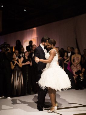 Serena in her third gown by Versace with her husband Alexis. Photo by Mel Barlow and Allan Zepeda