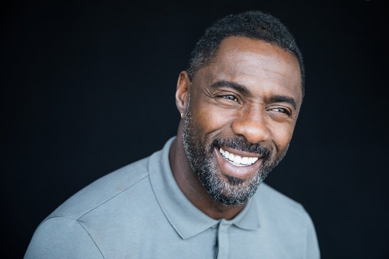 Idris Elba smiling