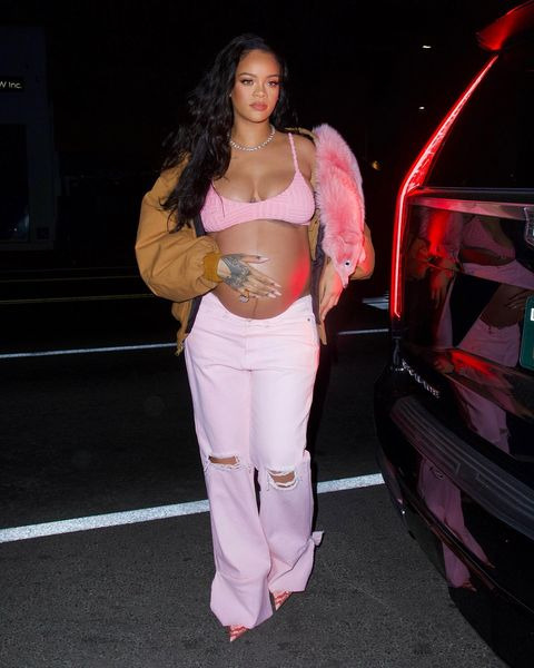 Pregnant Rihanna Bares Her Bump in Pharrell's First Collection for