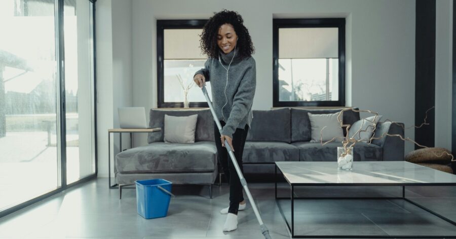 African American woman applying easy tips to organize your home for spring cleaning