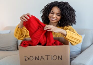 African American woman applying easy tips to organize your home for spring cleaning