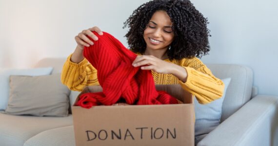 African American woman applying easy tips to organize your home for spring cleaning
