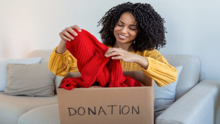 African American woman applying easy tips to organize your home for spring cleaning