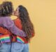 Ways to celebrate pride month - lesbian couple attending pride