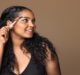 African American woman showing tips for perfect eyebrows