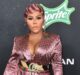 Big Mama Thangs: Lil' Kim's Best Fashion Looks