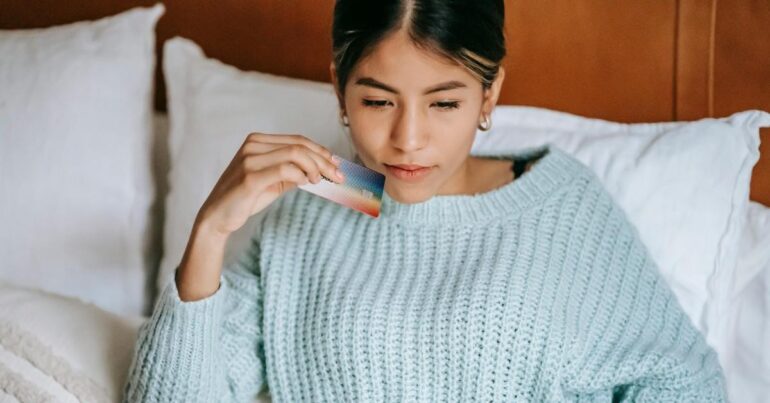 women with credit card SOURCE: Pexels