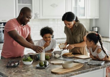 family making breakfast in the kitchen