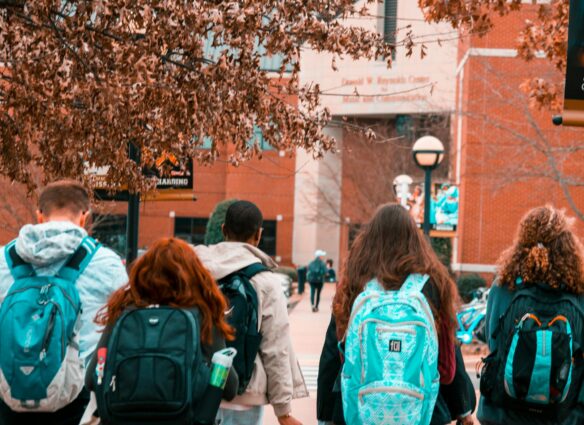 people wearing backpacks